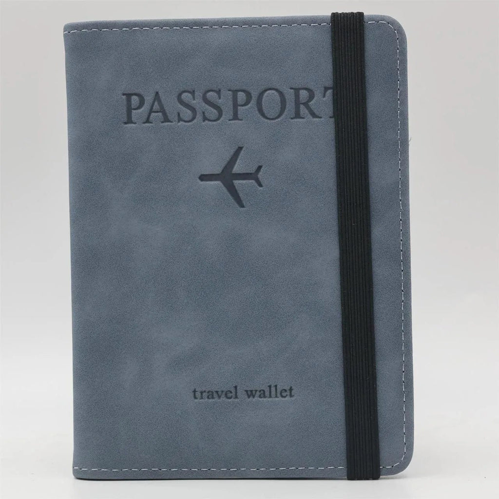 blue passport travel wallet with black strap on a white background